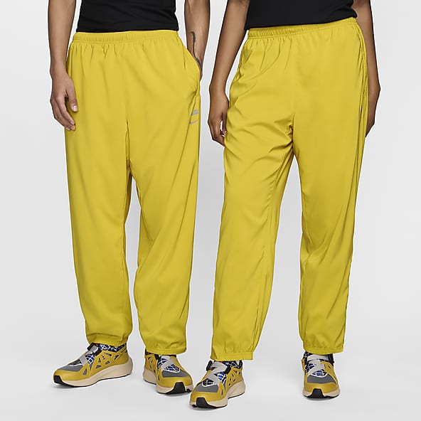 Nike pants yellow deals